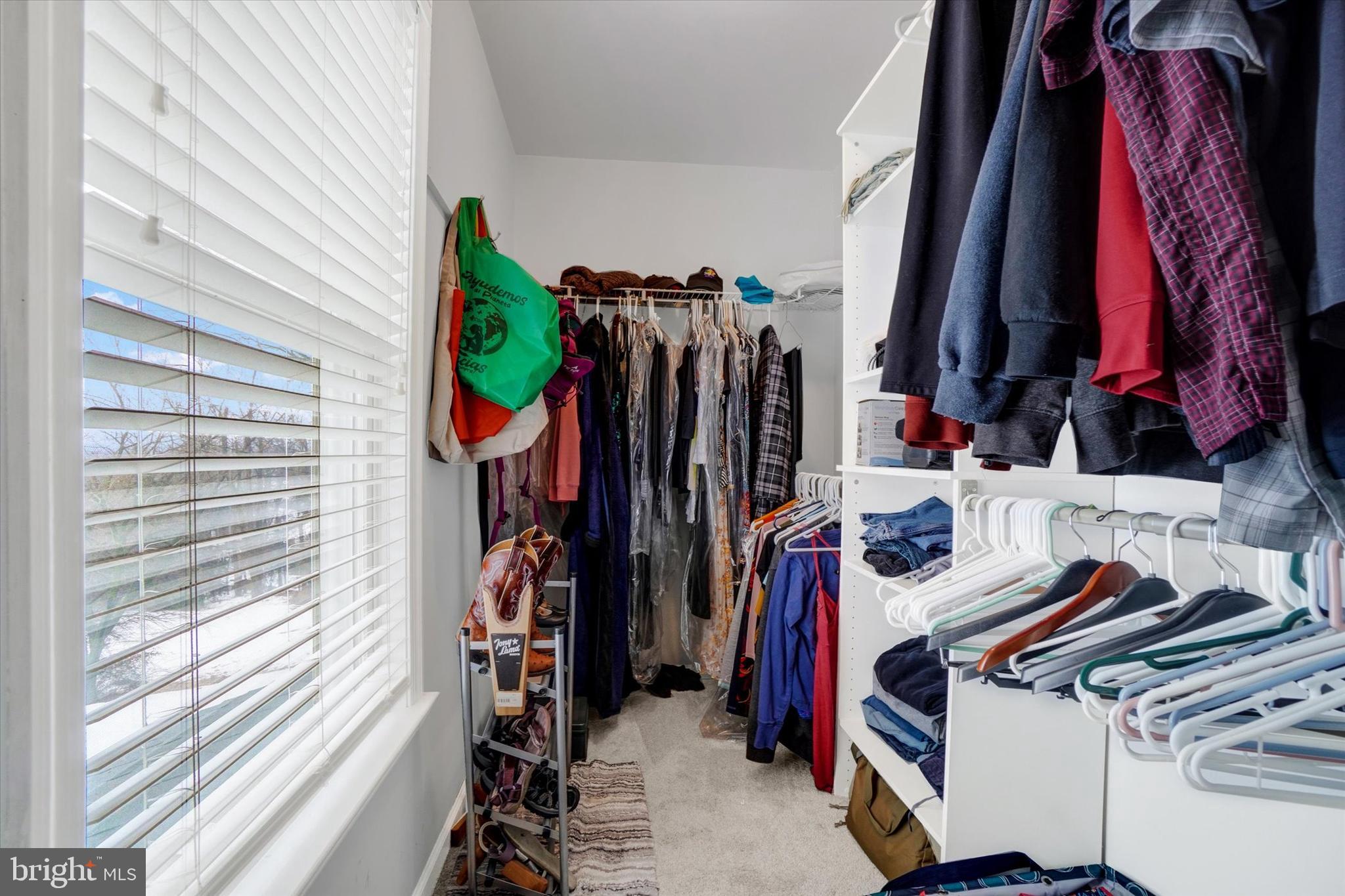 194 Willis Road Etters, PA 17319 - Photo 16 of 31 a view of walk in closet with clothes