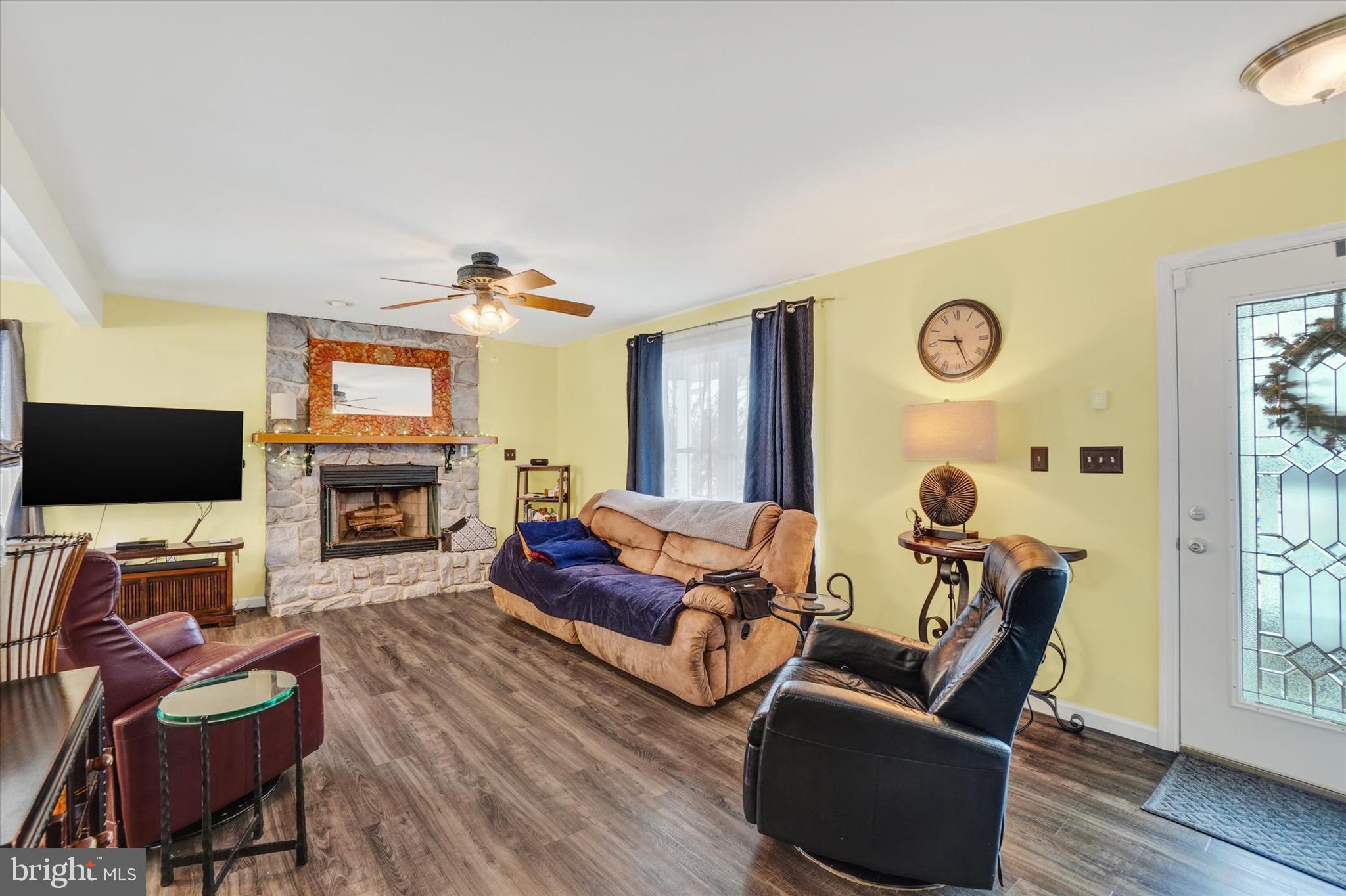 194 Willis Road Etters, PA 17319 - Photo 4 of 31 a living room with fireplace furniture and a flat screen tv