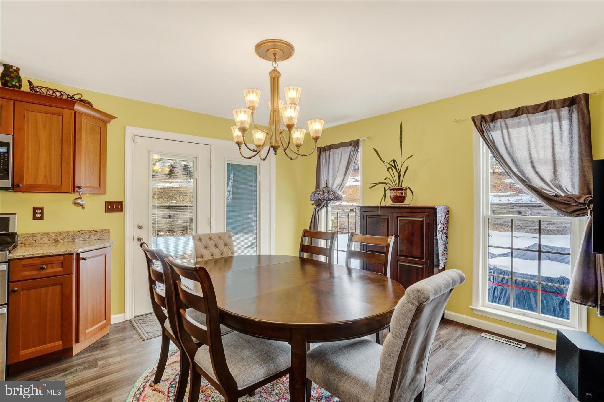 194 Willis Road Etters, PA 17319 - Photo 9 of 31 a view of a dining room with furniture window and wooden floor