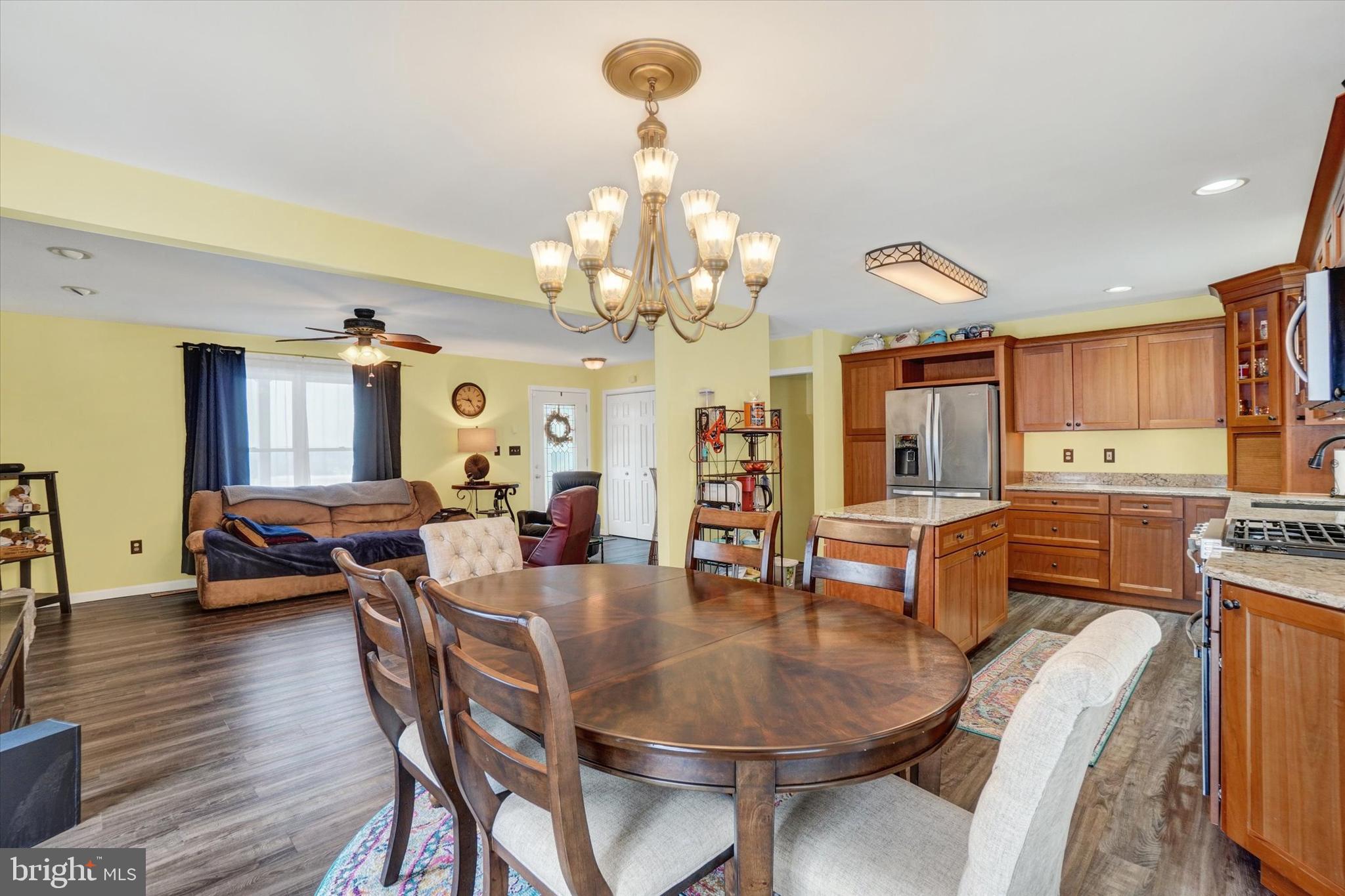 194 Willis Road Etters, PA 17319 - Photo 10 of 31 a view of a dining room with furniture and wooden floor
