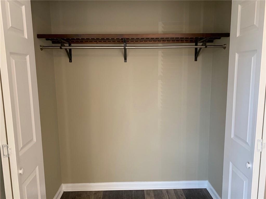 1261 Concord Road Southeast Smyrna, GA 30080 - Photo 12 of 50 a view of a room with racks on the wall