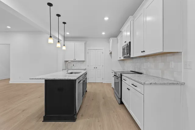 a view of an empty walk in closet