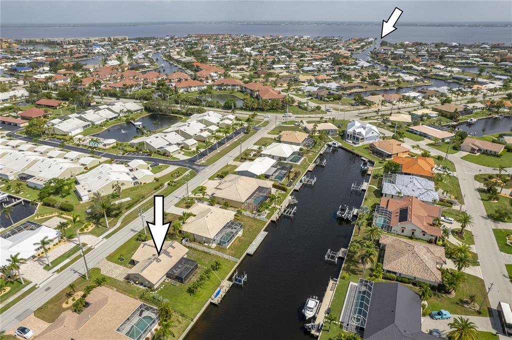 380 Coronado Drive Punta Gorda, FL 33950 - Photo 1 of 37 an aerial view of residential houses with outdoor space