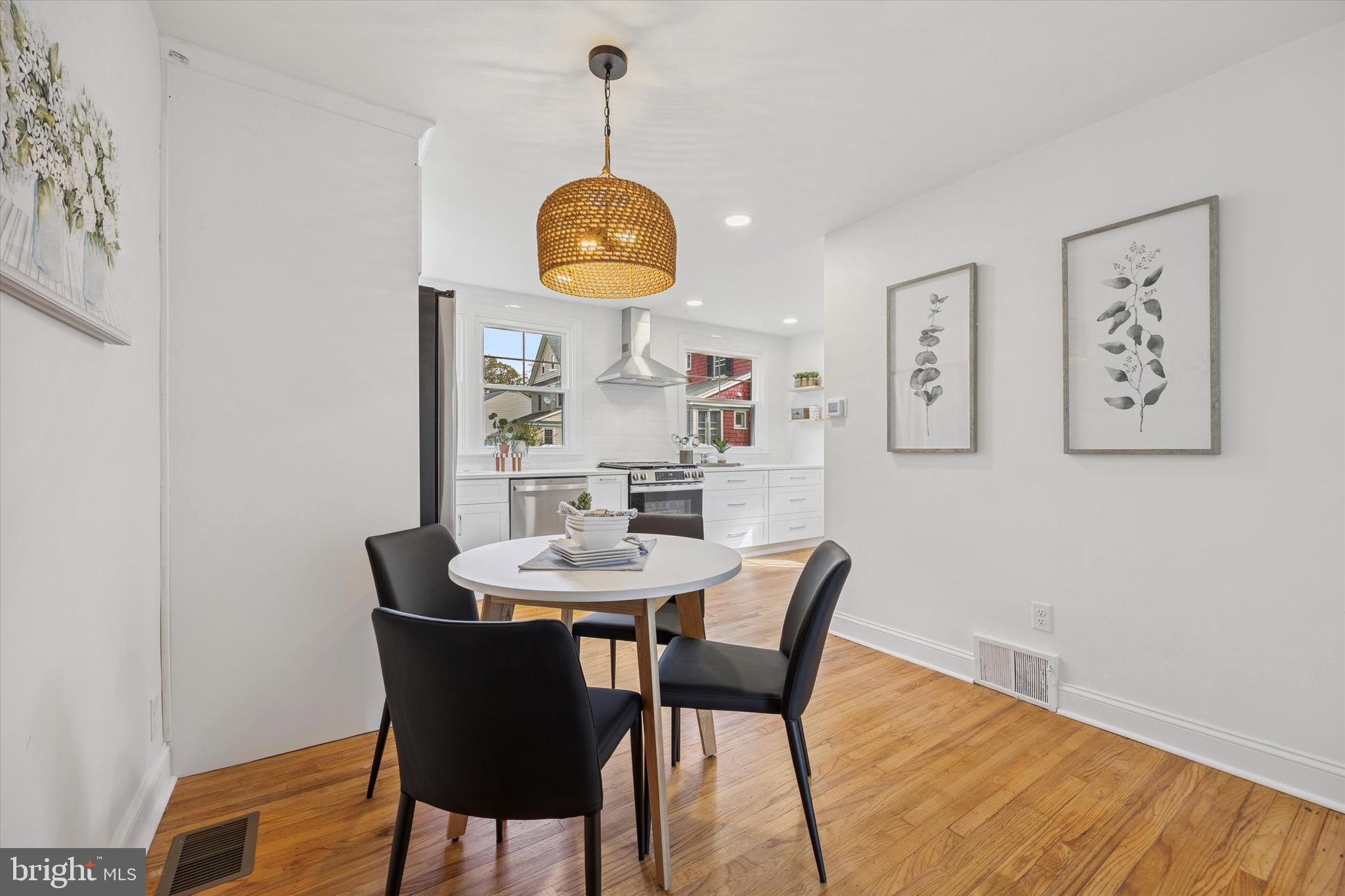 5 Llanfair Road Ardmore, PA 19003 - Photo 14 of 25 a view of a dining room with furniture and wooden floor