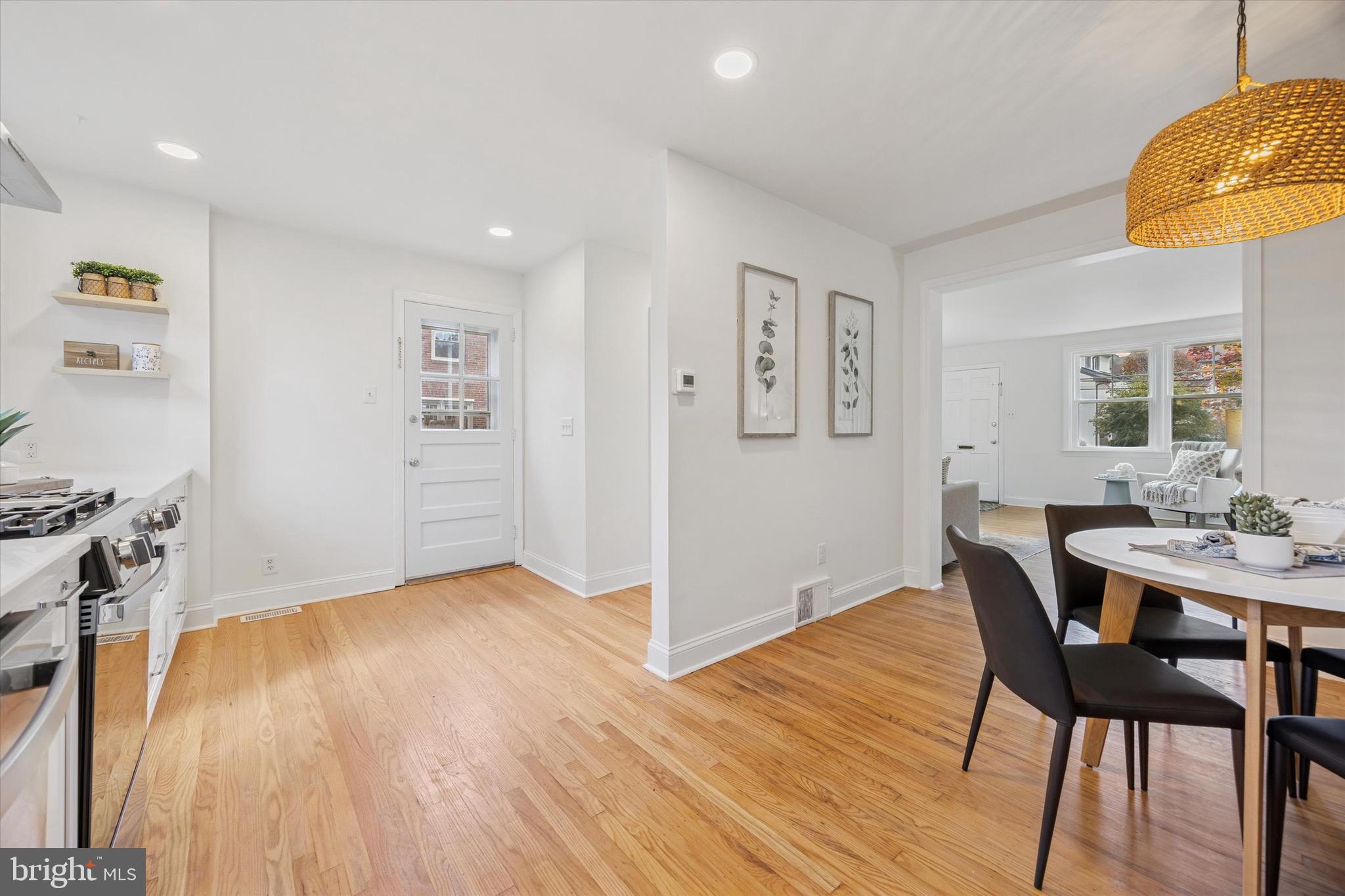 5 Llanfair Road Ardmore, PA 19003 - Photo 16 of 25 a view of a dining room with furniture and wooden floor