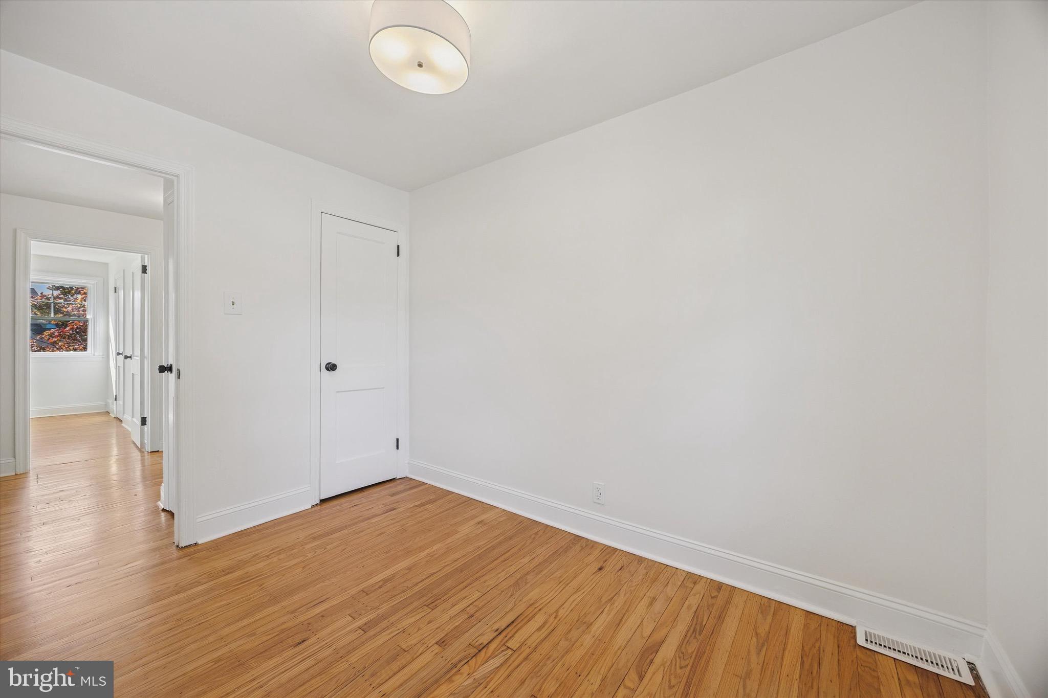 5 Llanfair Road Ardmore, PA 19003 - Photo 23 of 25 wooden floor in an empty room