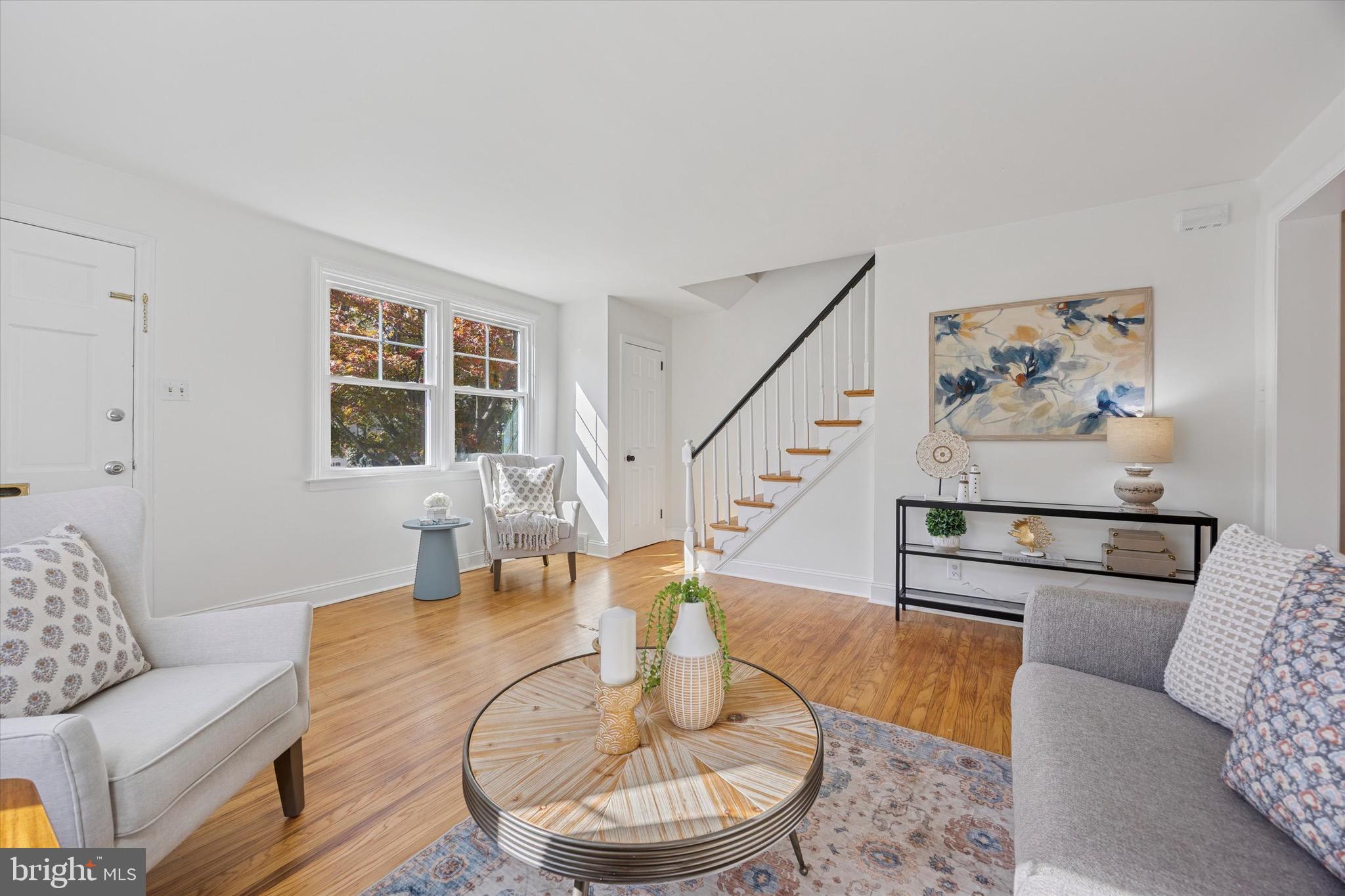 5 Llanfair Road Ardmore, PA 19003 - Photo 5 of 25 a living room with furniture and wooden floor
