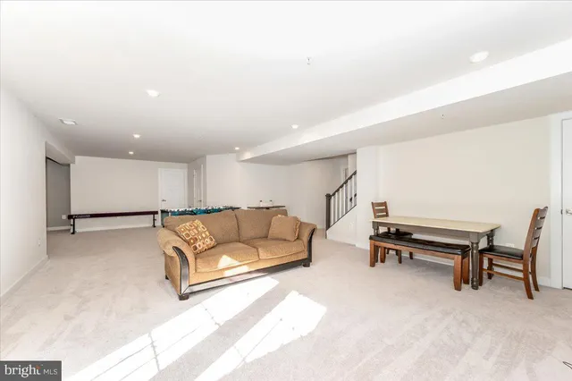 a view of a field with an ocean view