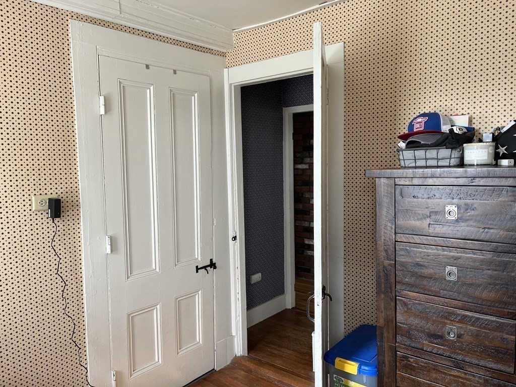 33 Singletary Avenue Sutton, MA 01590 - Photo 24 of 33 a view of a hallway with wooden floor