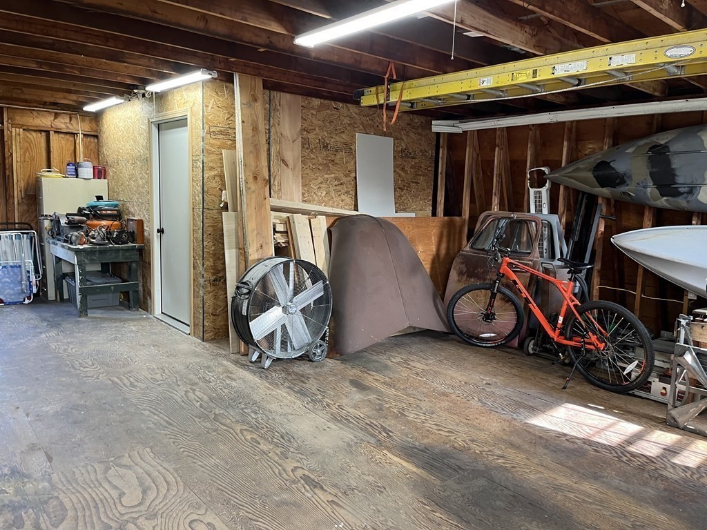 33 Singletary Avenue Sutton, MA 01590 - Photo 9 of 33 a view of a room with gym equipment