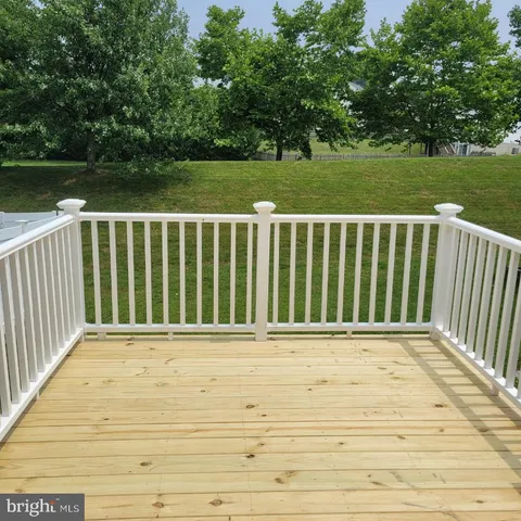 a view of deck with a yard