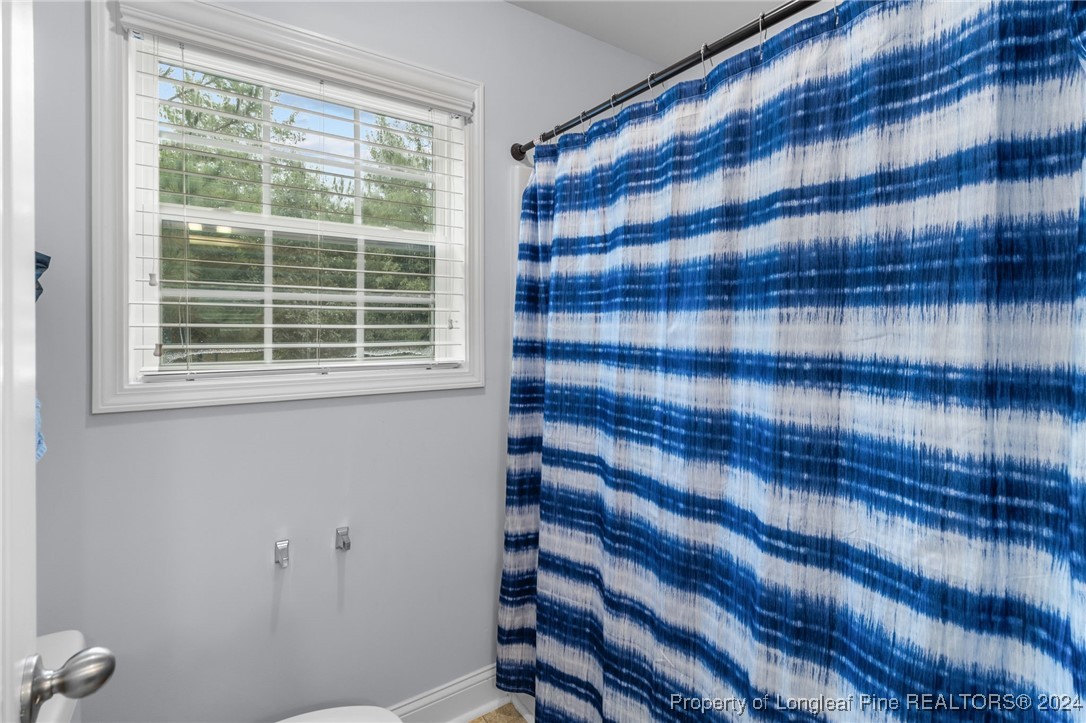 180 Pittfield Run Cameron, NC 28326 - Photo 24 of 33 a view of entryway with wooden floor and windows