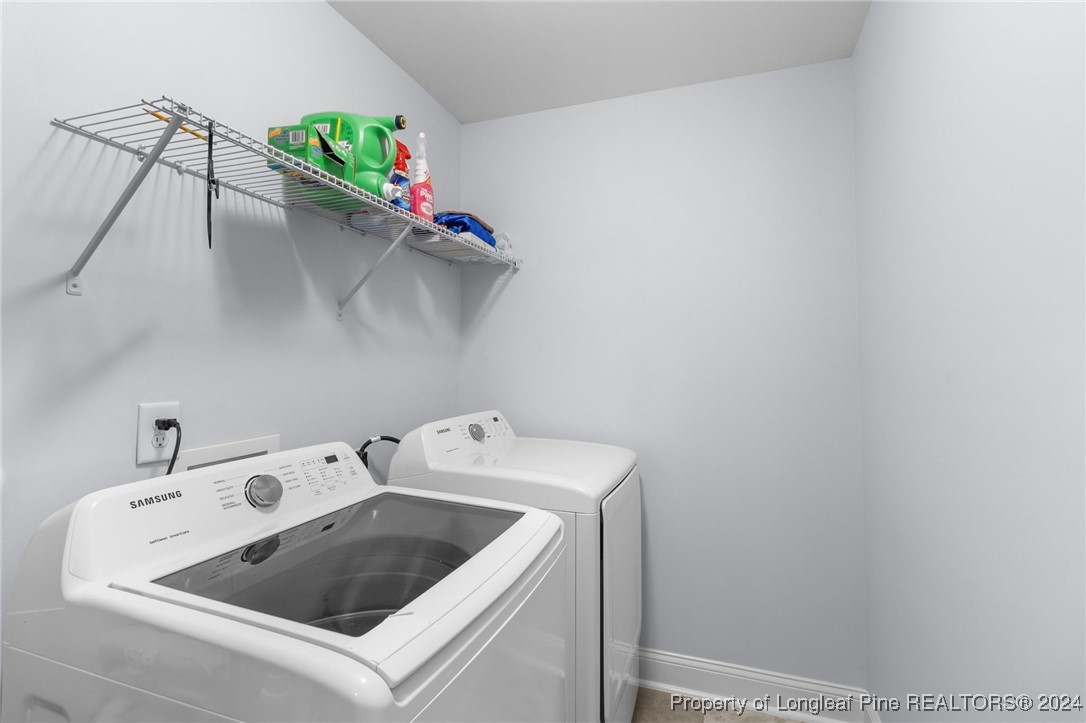 180 Pittfield Run Cameron, NC 28326 - Photo 26 of 33 a utility room with dryer and washer