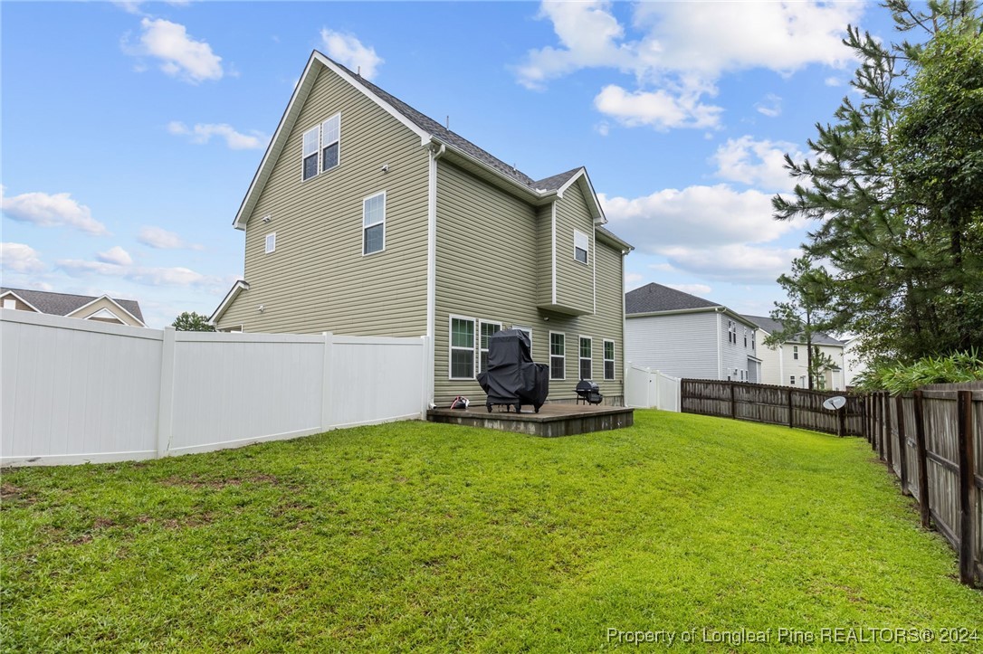 180 Pittfield Run Cameron, NC 28326 - Photo 32 of 33 a view of a house with a yard and sitting area