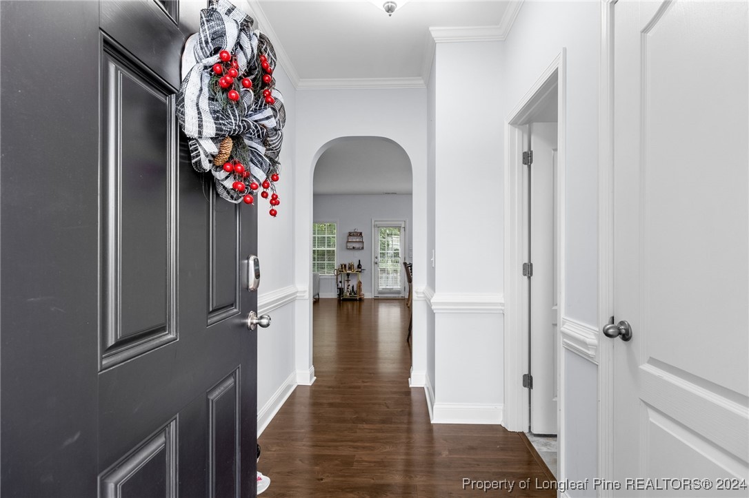 180 Pittfield Run Cameron, NC 28326 - Photo 5 of 33 a hallway with a flower garden and entryway