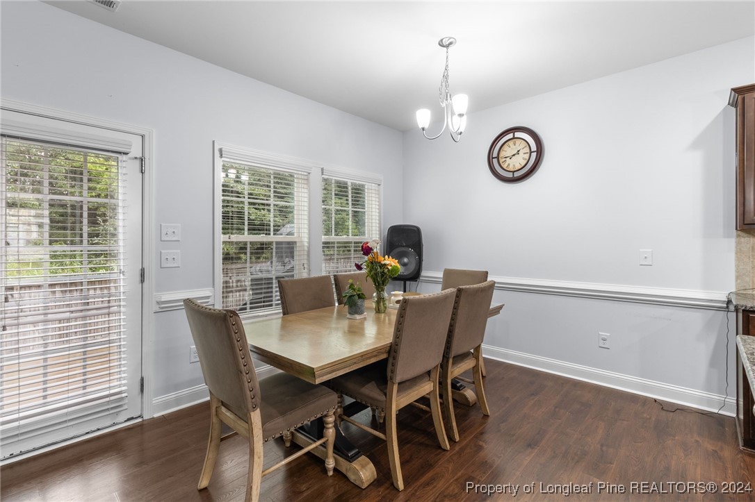 180 Pittfield Run Cameron, NC 28326 - Photo 10 of 33 a view of a dining room with furniture window and wooden floor