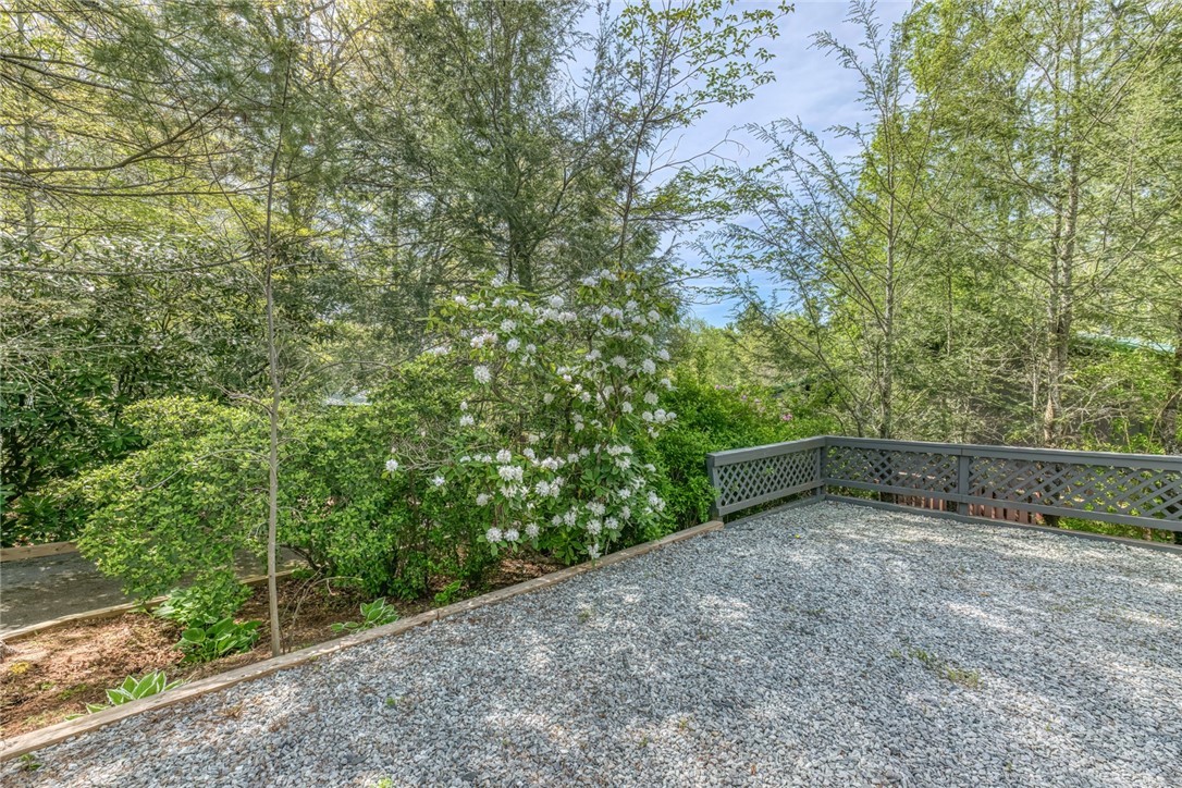 174 Spruce Pine Road Newland, NC 28657 - Photo 4 of 50 a view of a field with trees in the background
