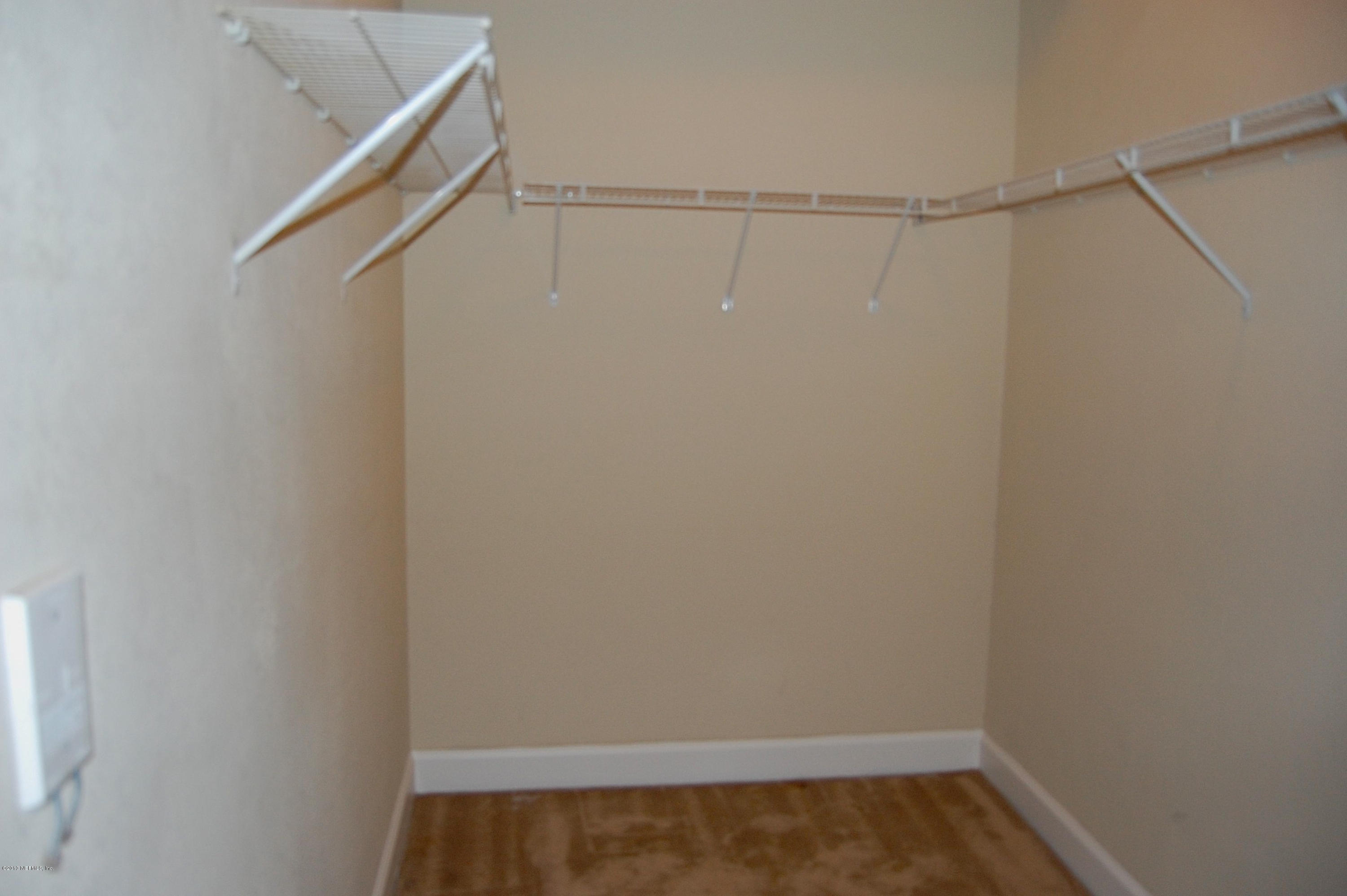 9745 Touchton Road, Unit 1004 Jacksonville, FL 32246 - Photo 15 of 23 master bedroom walk in closet