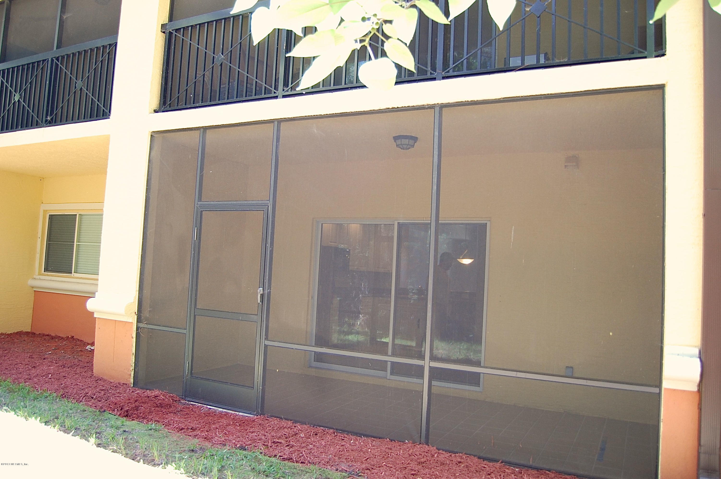 9745 Touchton Road, Unit 1004 Jacksonville, FL 32246 - Photo 21 of 23 screened lanai from outside