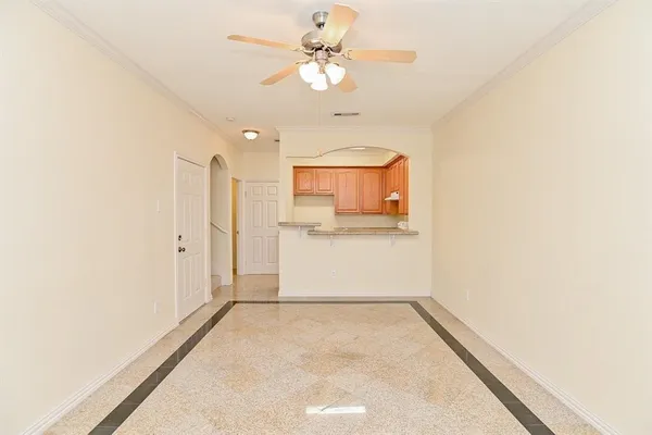a view of a kitchen with a sink and a window