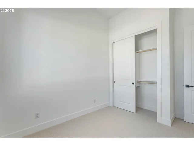 a view of empty room with a window