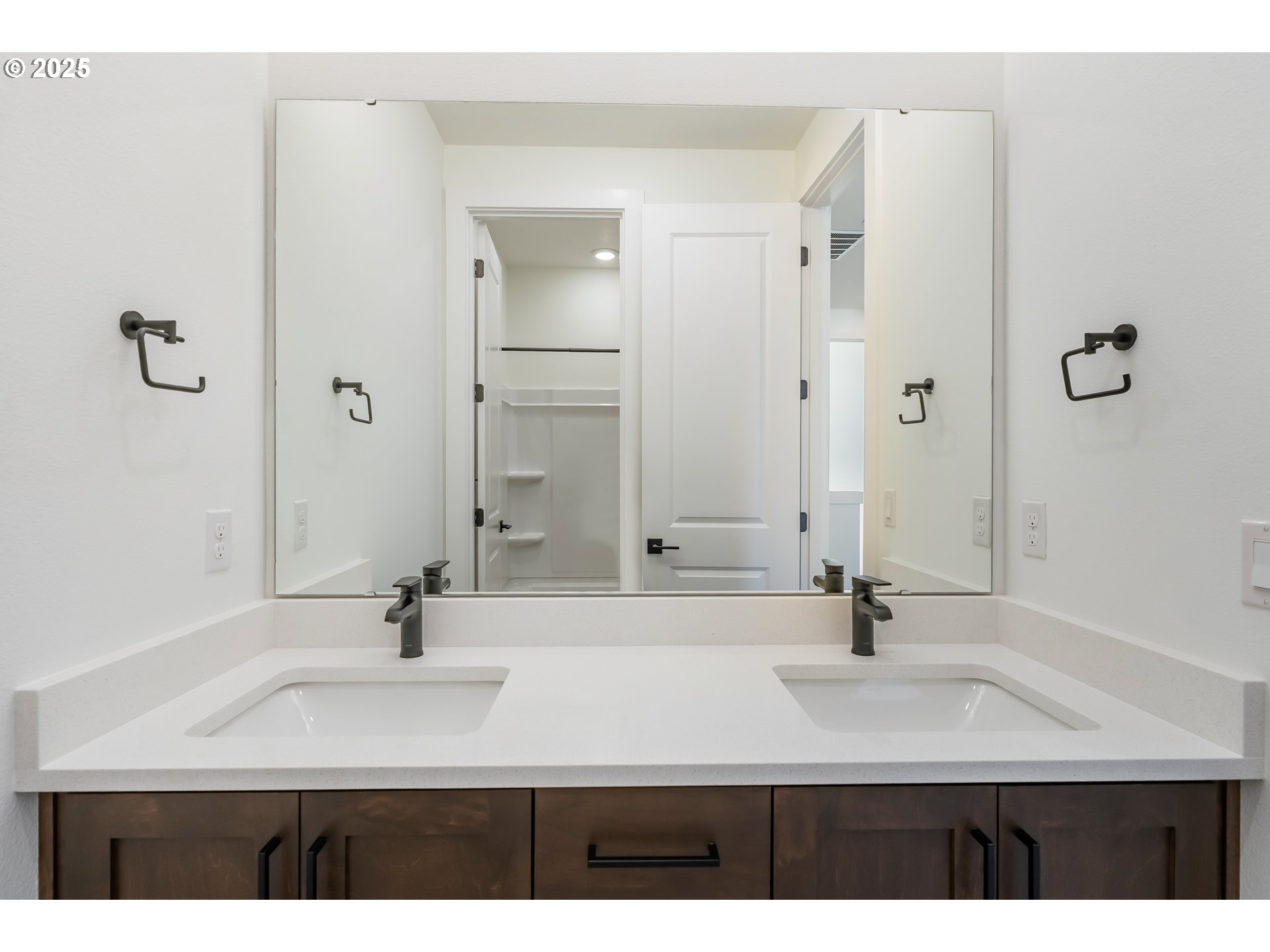 6483 Northwest Olympic Lane, Unit L28 Camas, WA 98607 - Photo 27 of 42 a bathroom with a sink and a mirror