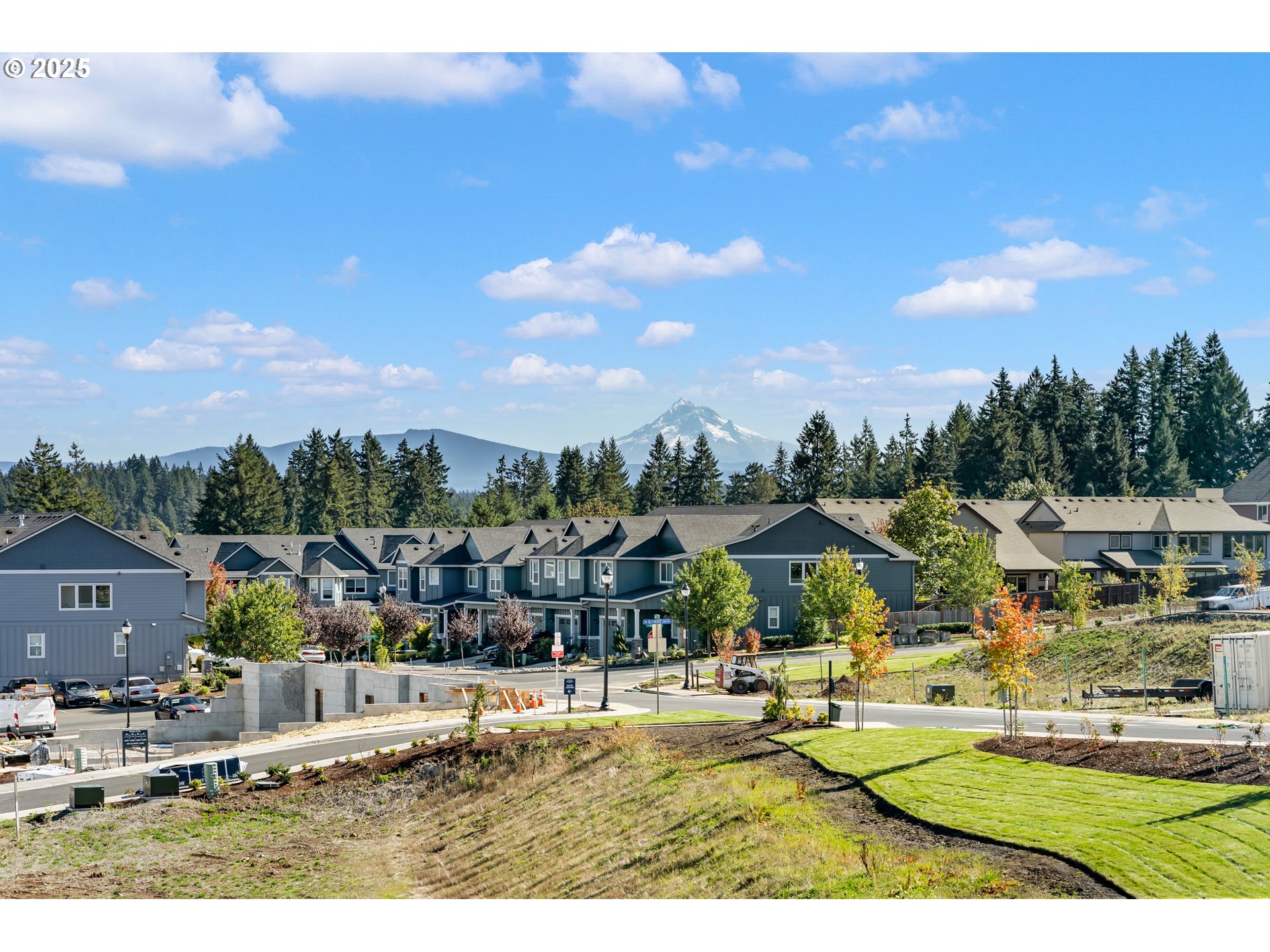 6483 Northwest Olympic Lane, Unit L28 Camas, WA 98607 - Photo 30 of 42 a view of a town with big houses