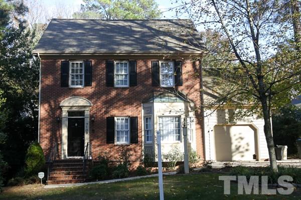 front view of house with a garden