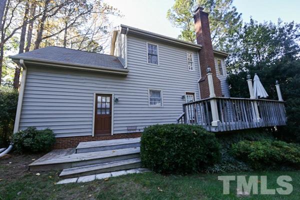 7108 Kinross Drive Raleigh, NC 27613 - Photo 25 of 25 a view of a back yard of the house