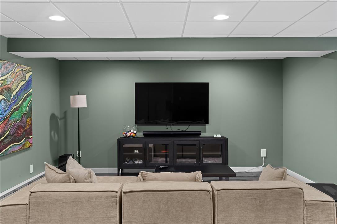 1506 Pleasant View Road Coopersburg, PA 18036 - Photo 68 of 97 Recessed lighting illuminates this inviting entertainment area, perfect for relaxation or gatherings.