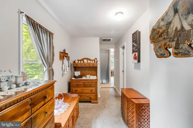 a room with furniture and a window