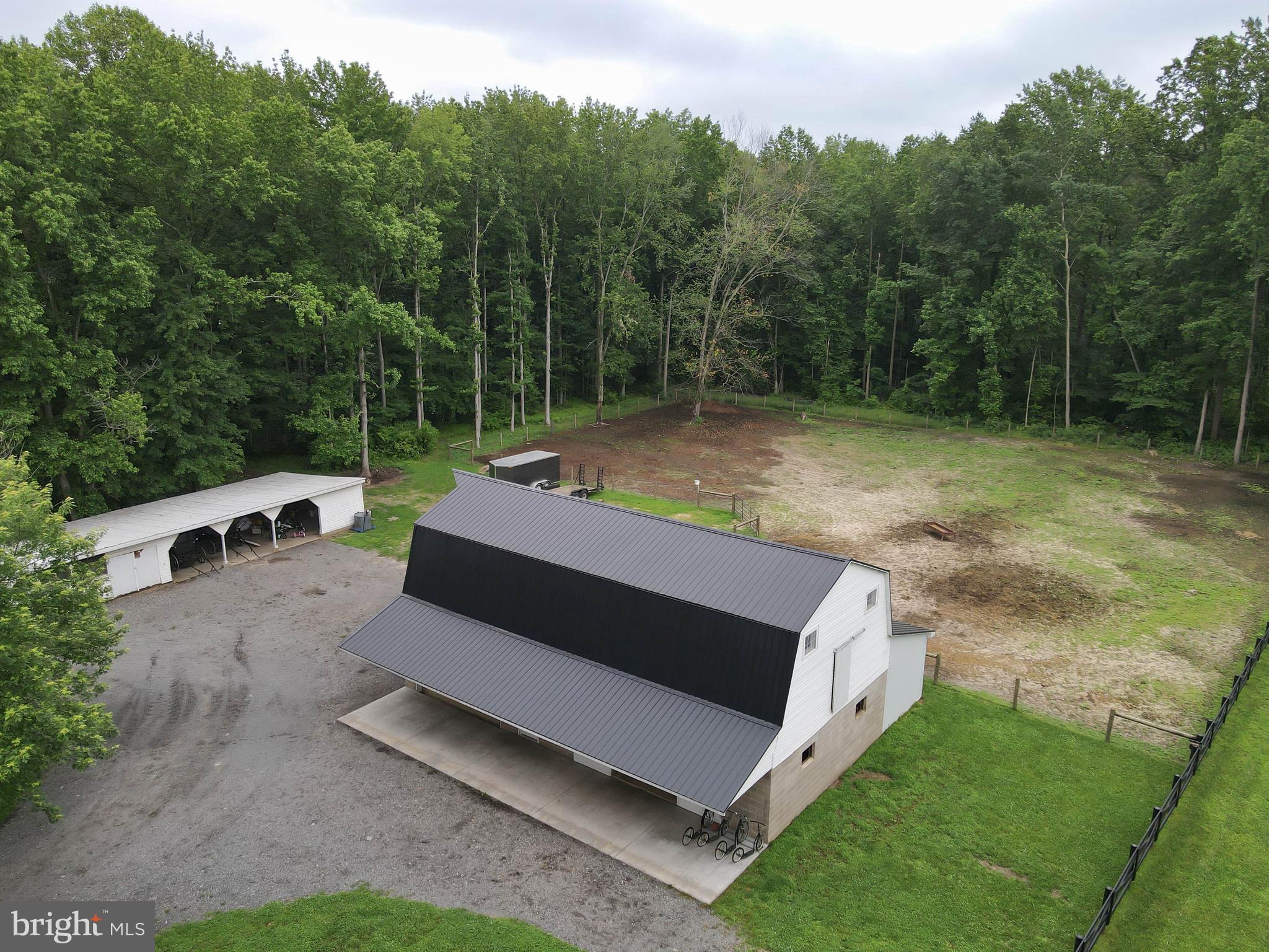 5634 Pearsons Corner Road Dover, DE 19904 - Photo 30 of 40 a view of a backyard with sitting area