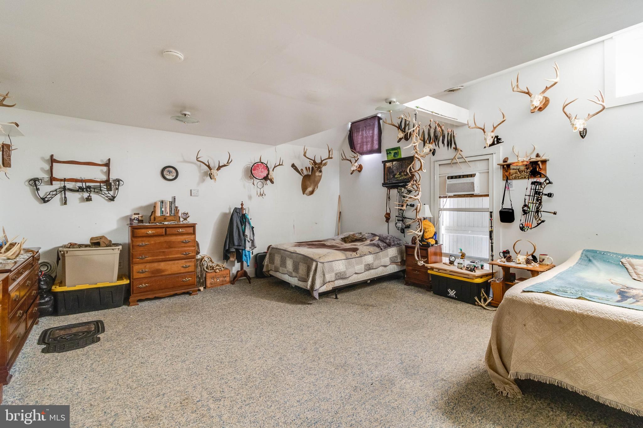 5634 Pearsons Corner Road Dover, DE 19904 - Photo 32 of 40 a bedroom with furniture and a baby crib