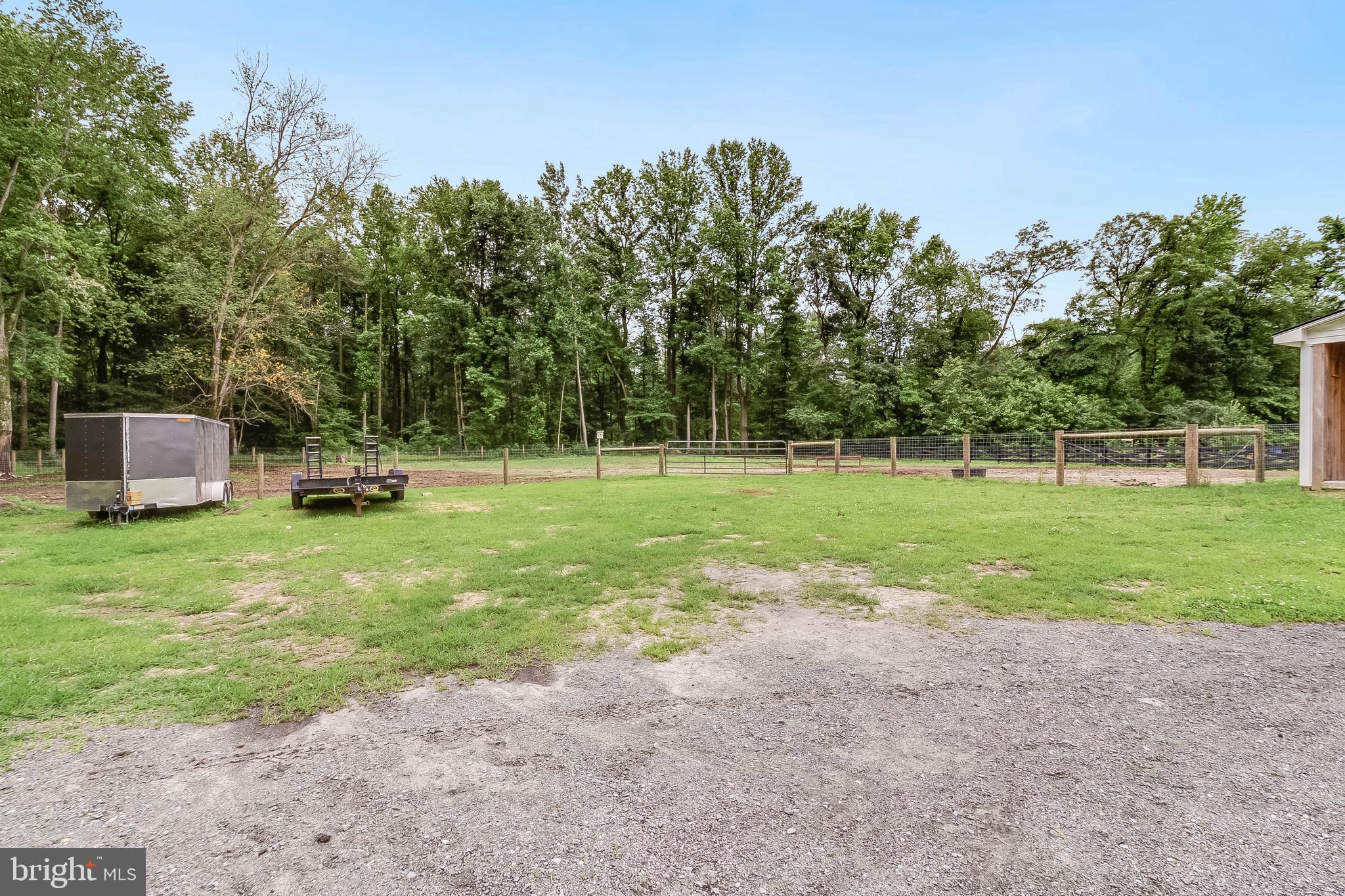 5634 Pearsons Corner Road Dover, DE 19904 - Photo 36 of 40 a front view of a house with a yard