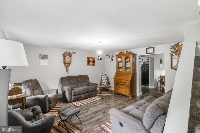 a living room with furniture and a couch