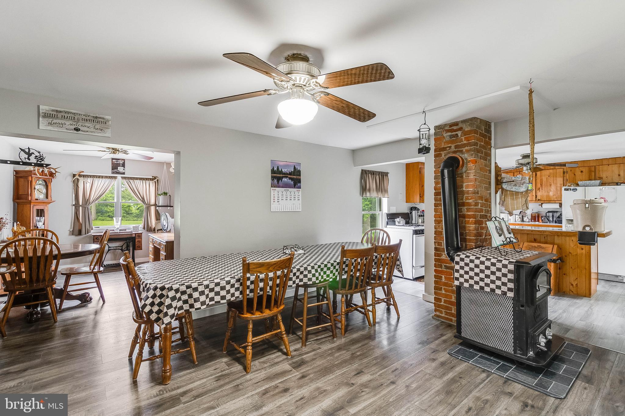 5634 Pearsons Corner Road Dover, DE 19904 - Photo 8 of 40 a view of a dining room with furniture window and wooden floor