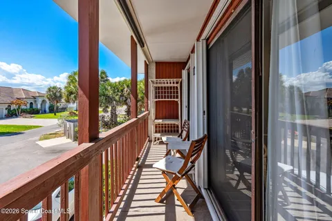 a view of a two chair in the balcony