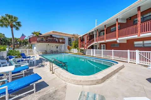 a view of a house with a swimming pool