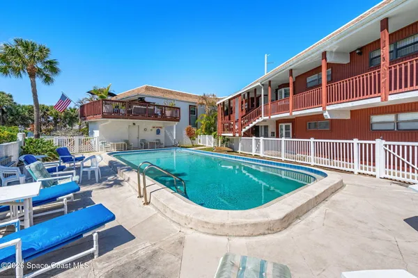 a view of a house with a swimming pool