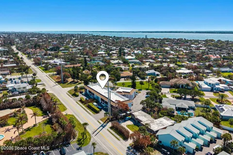 a picture of a bench in front of a wall