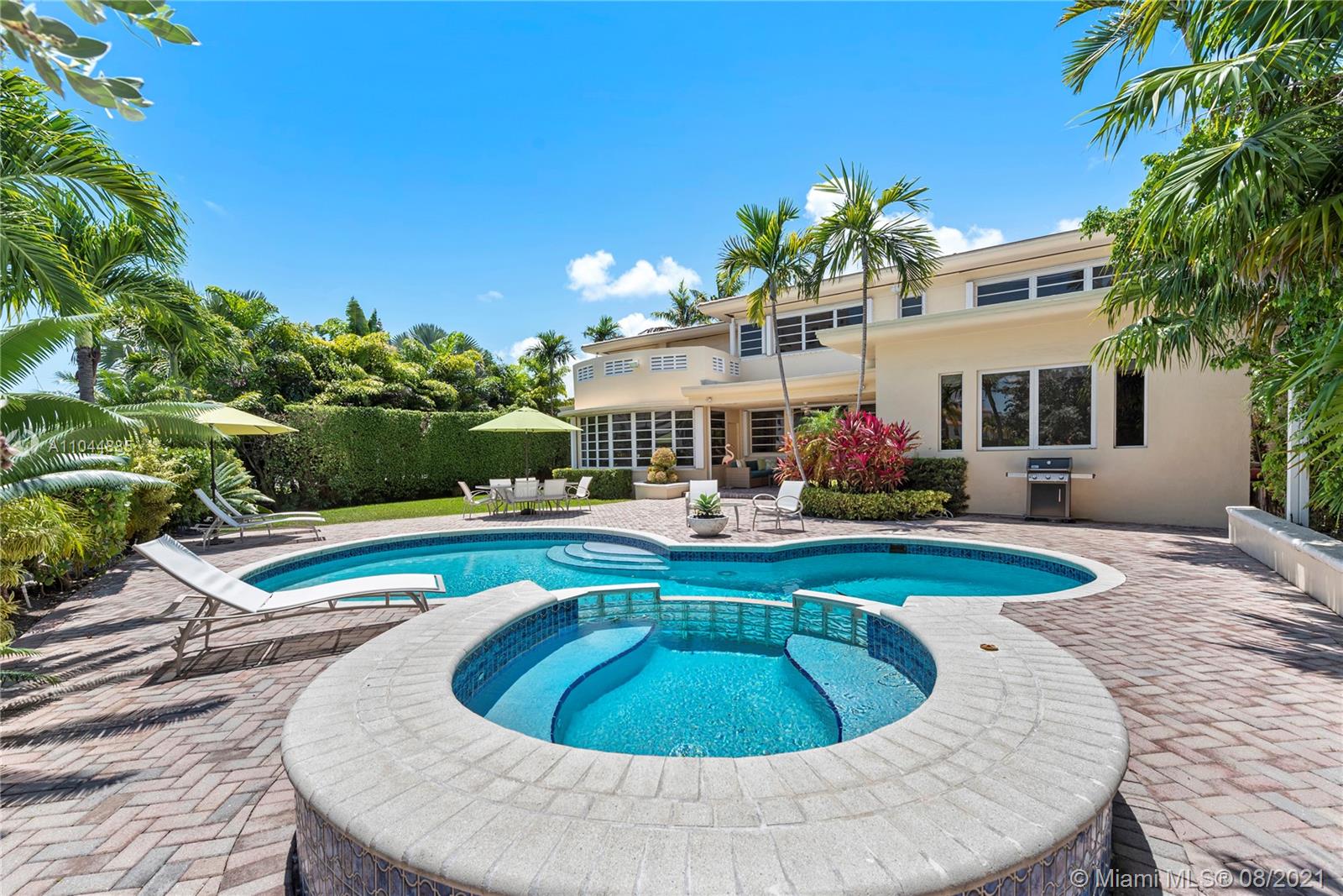 2995 Flamingo Drive Miami Beach, FL 33140 - Photo 18 of 54 a view of outdoor space yard swimming pool and patio