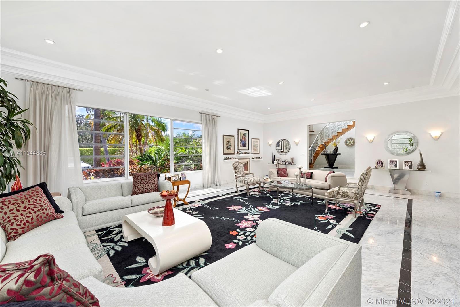 2995 Flamingo Drive Miami Beach, FL 33140 - Photo 24 of 54 a living room with furniture and a large window