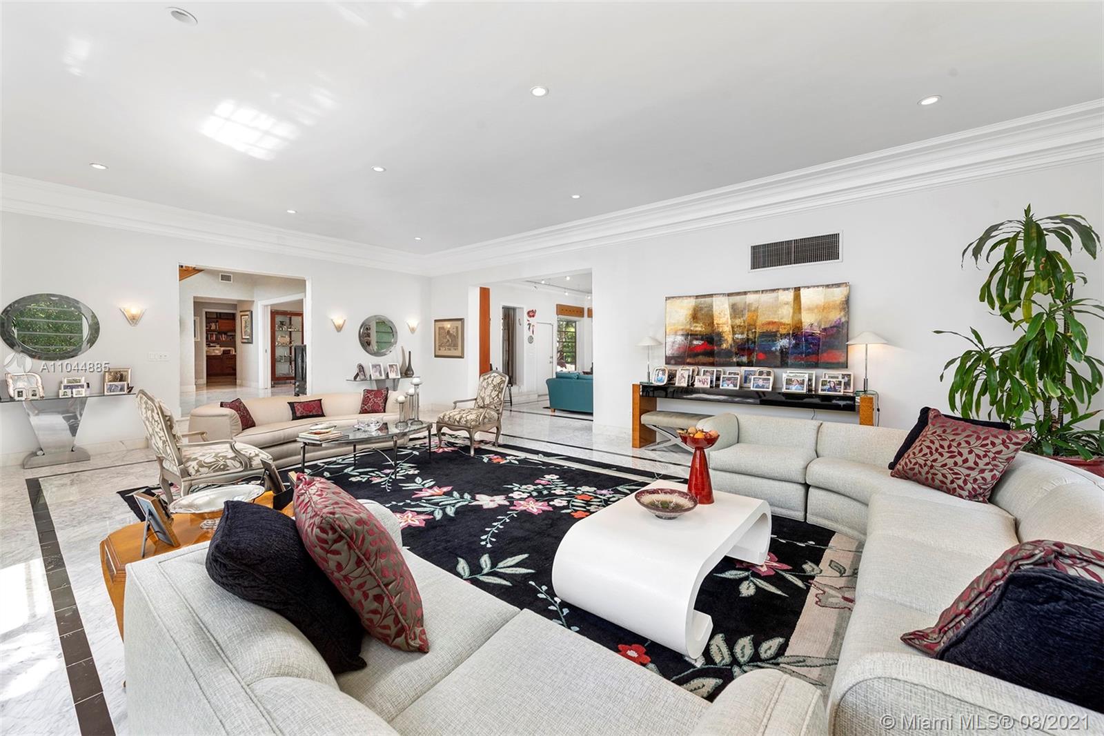 2995 Flamingo Drive Miami Beach, FL 33140 - Photo 25 of 54 a living room with furniture and a flat screen tv