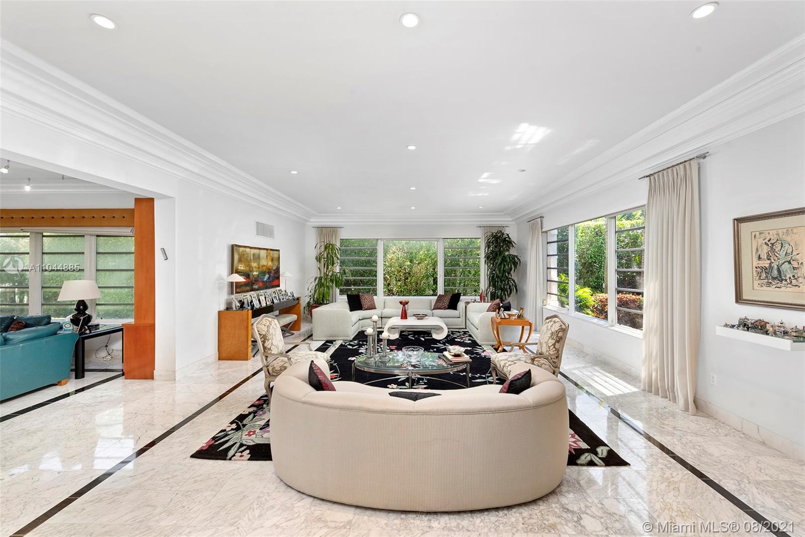 2995 Flamingo Drive Miami Beach, FL 33140 - Photo 37 of 54 a living room with furniture and a large window