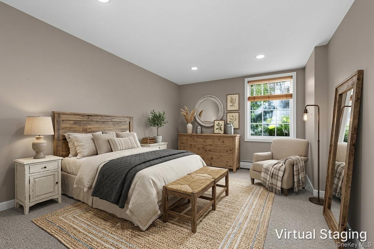 2211 Crompond Road Yorktown Heights, NY 10598 - Photo 26 of 38 a bedroom with a large bed couch and a window