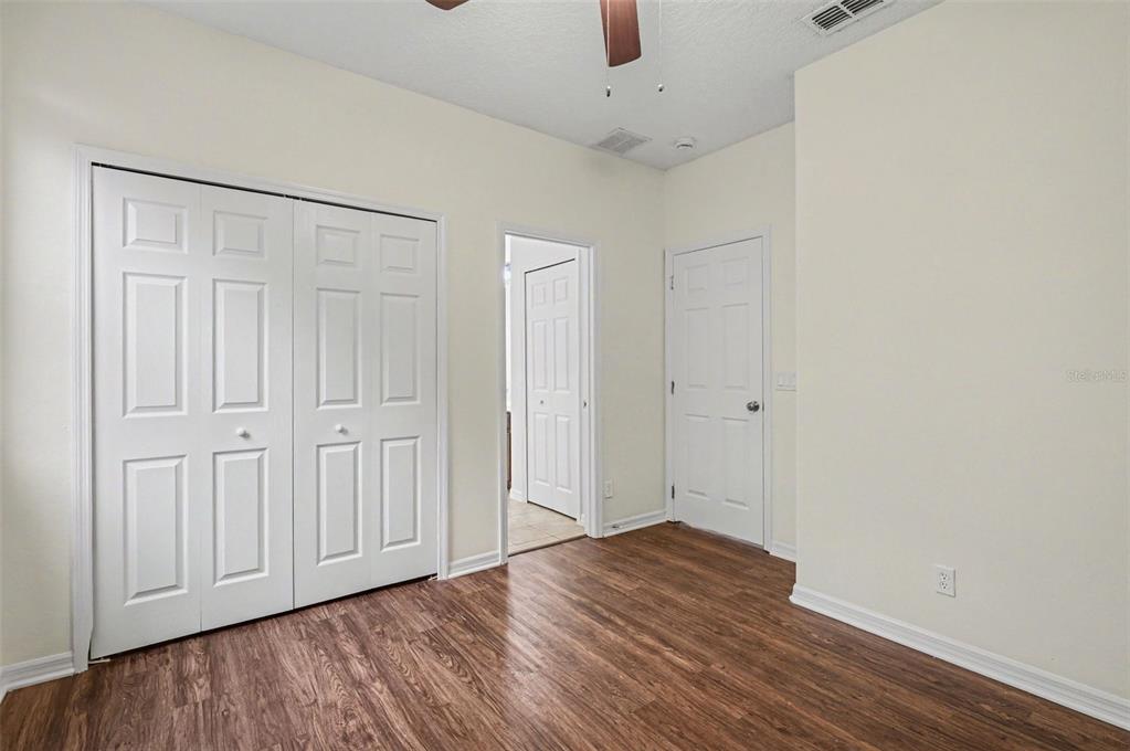 4819 Indian Deer Road Windermere, FL 34786 - Photo 19 of 30 an empty room with wooden floor
