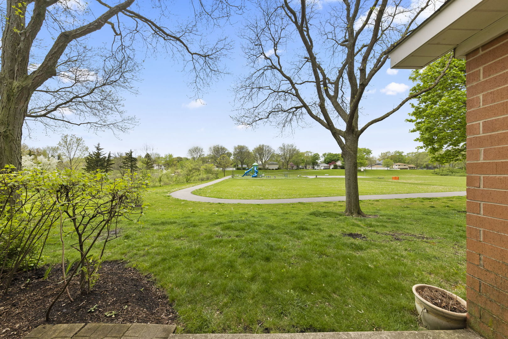 1338 South Lorraine Road, Unit D Wheaton, IL 60189 - Photo 19 of 23 a view of a field with trees