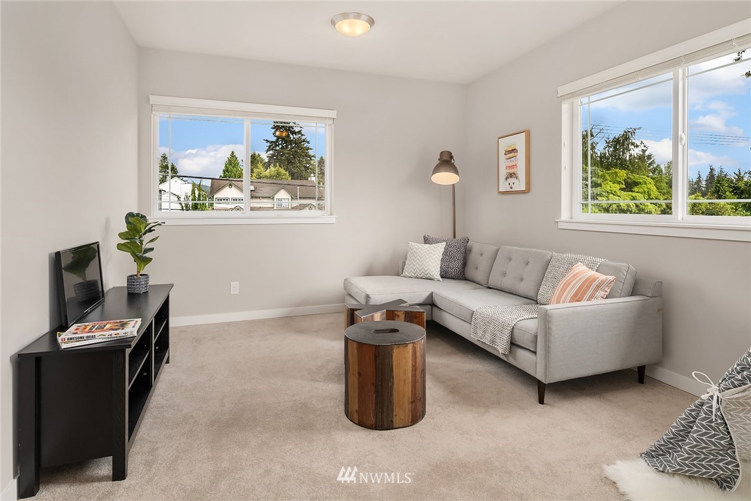 4024 Northeast 20th Street Renton, WA 98059 - Photo 22 of 27 a living room with furniture and a window