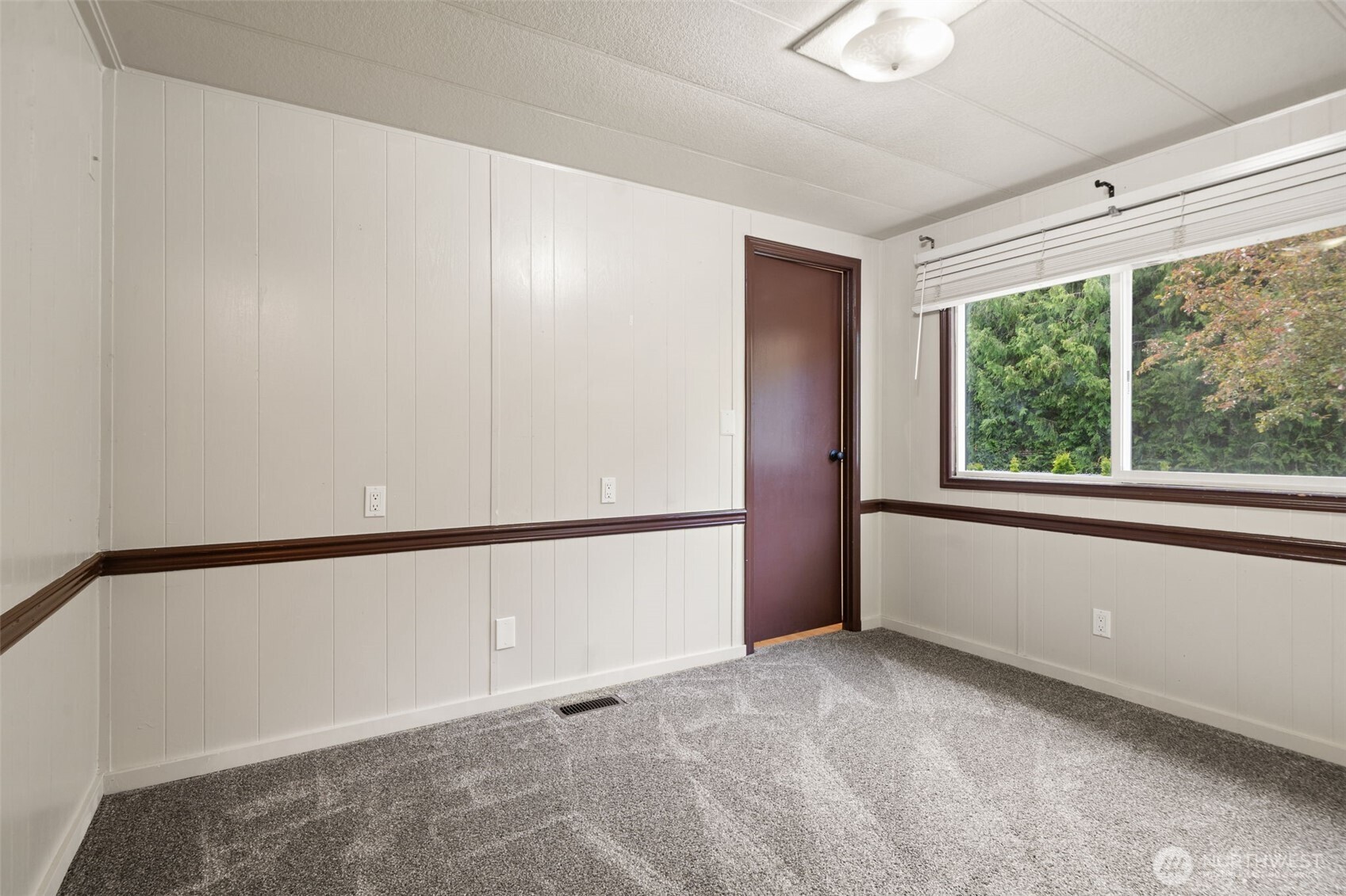 400 Gupster Road, Unit 1 Sequim, WA 98382 - Photo 19 of 39 a view of an empty room with a window