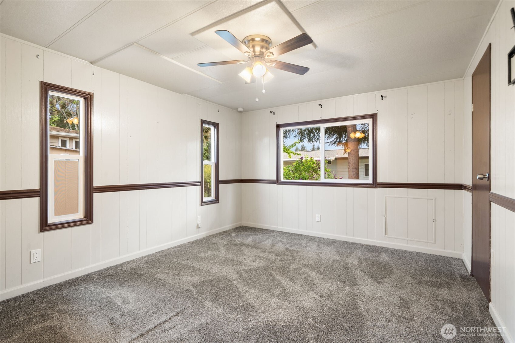 400 Gupster Road, Unit 1 Sequim, WA 98382 - Photo 21 of 39 a view of an empty room with a window